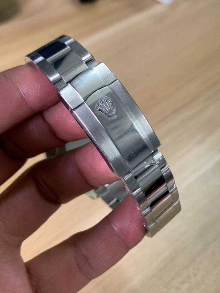 Cierre 1:1 con corona Rolex milgauss